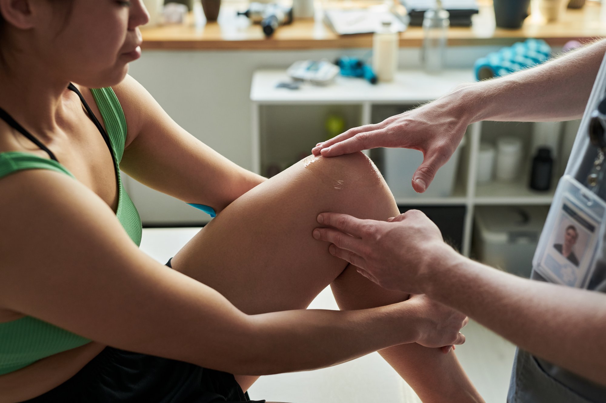 physiotherapist-conducting-a-patient-s-leg-examina-2024-11-29-00-17-18-utc